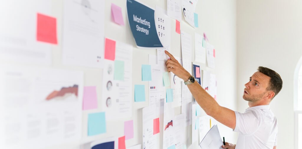 Man working on marketing strategy plan